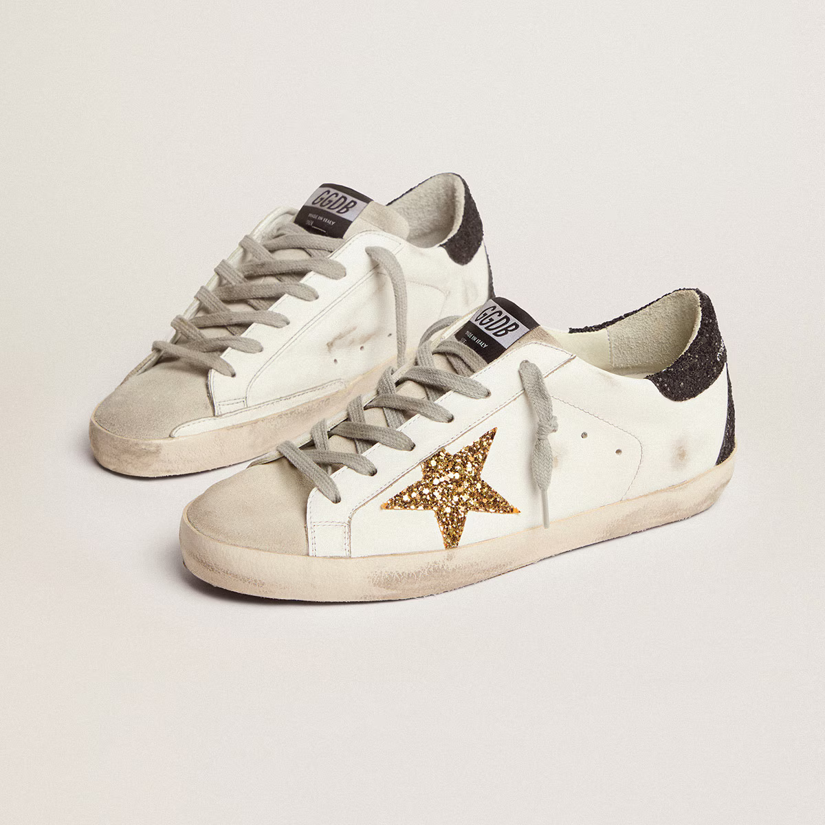 Women’s Super-Star in nappa leather with gold glitter star and black glitter heel tab