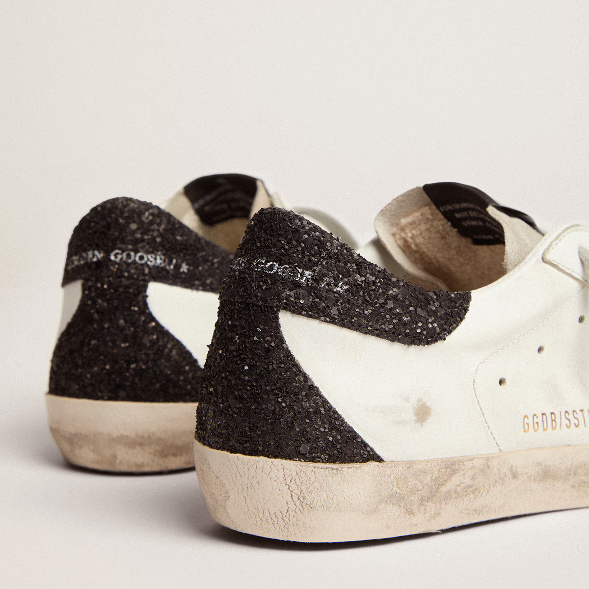 Women’s Super-Star in nappa leather with gold glitter star and black glitter heel tab