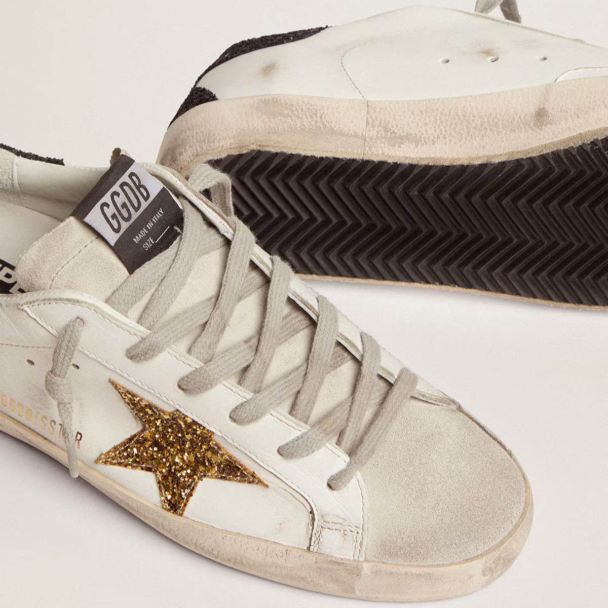 Women’s Super-Star in nappa leather with gold glitter star and black glitter heel tab